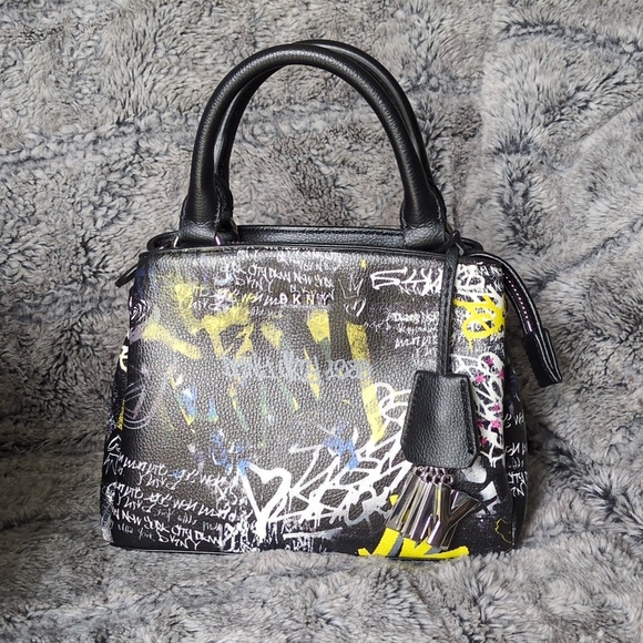Dkny Handbags - DKNY Paige small satchel crossbody handbag with a graffiti print.​